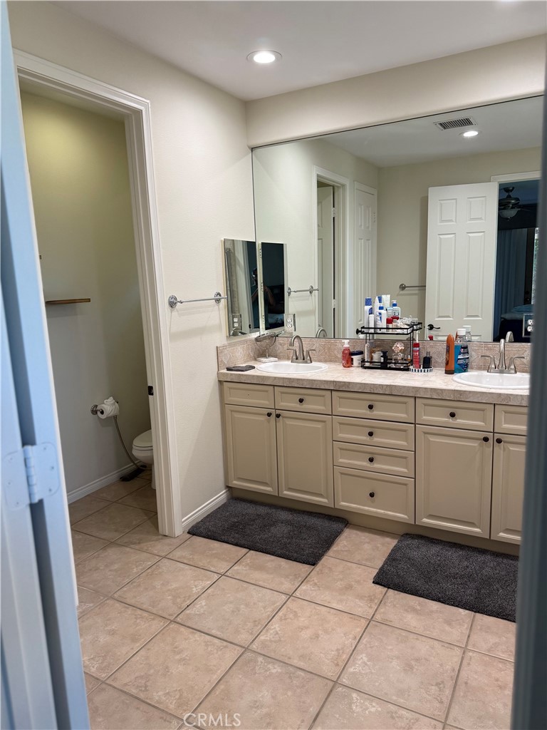 244 Via Padua Rancho Mirage, CA 92270 - Photo 13 of 35 a room with a washing machine and sink