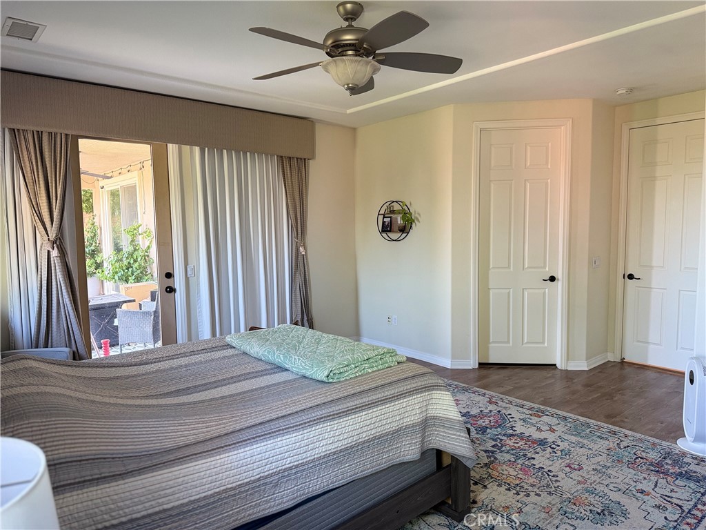 244 Via Padua Rancho Mirage, CA 92270 - Photo 14 of 35 a bedroom with a bed and a window