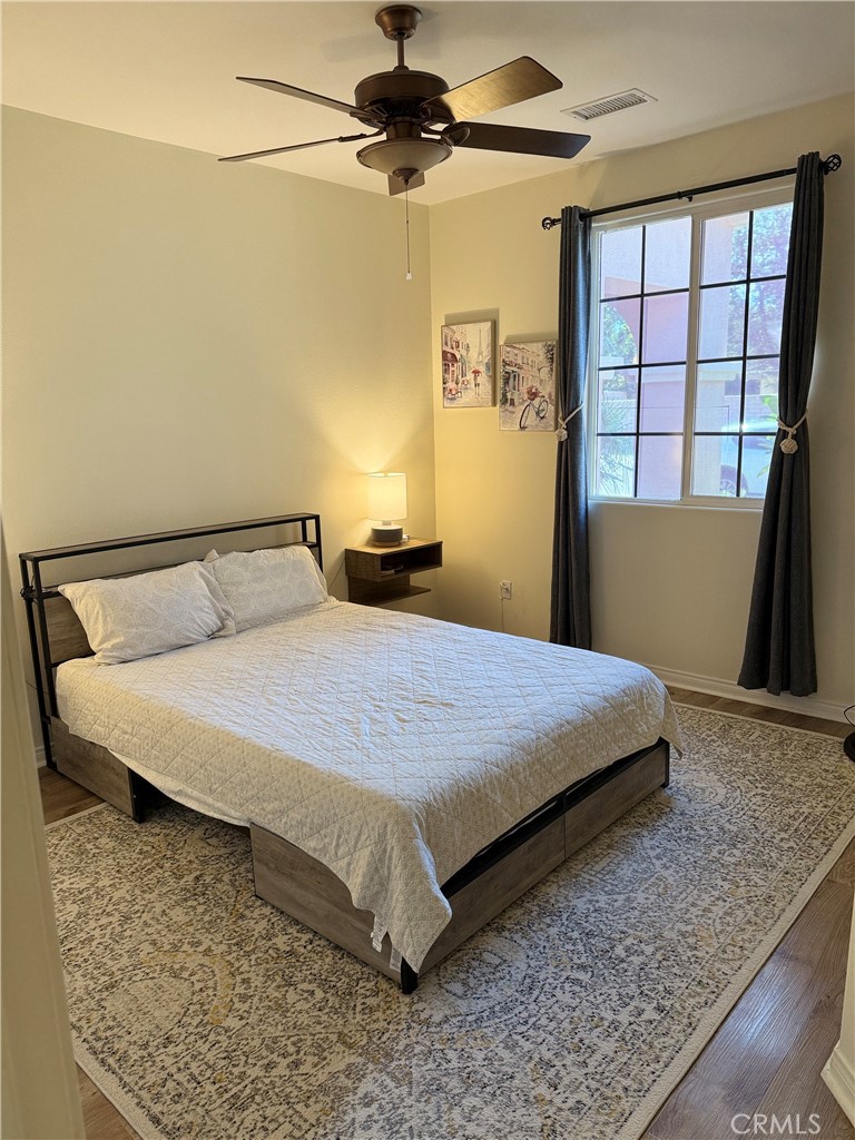 244 Via Padua Rancho Mirage, CA 92270 - Photo 22 of 35 a bedroom with a bed and a window