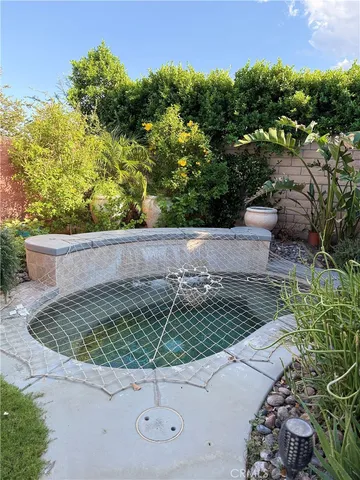 a view of a yard with an outdoor space