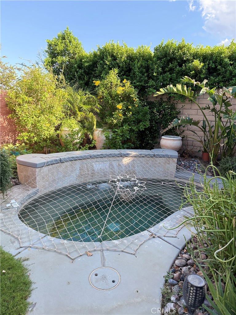 244 Via Padua Rancho Mirage, CA 92270 - Photo 27 of 35 a view of a wooden floor with a yard