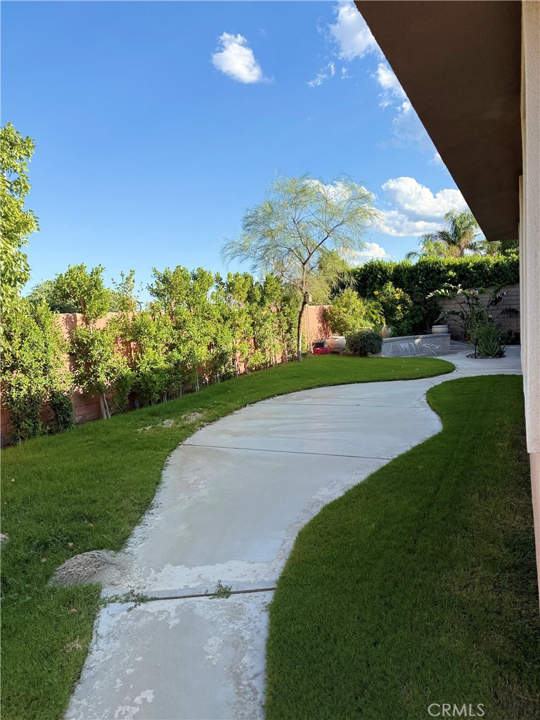 244 Via Padua Rancho Mirage, CA 92270 - Photo 30 of 35 a view of a golf course with a garden