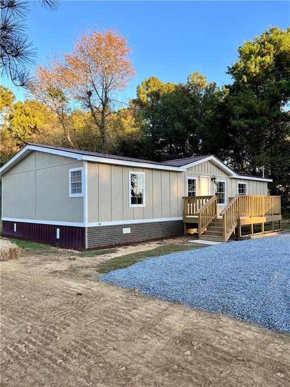 1229 Hall Memorial Road Northwest Resaca, GA 30735 - Photo 1 of 1 a view of a house with backyard