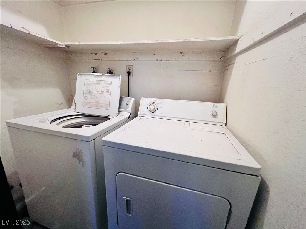 5048 Spencer Street, Unit C Las Vegas, NV 89119 - Photo 13 of 20 Washroom with independent washer and dryer