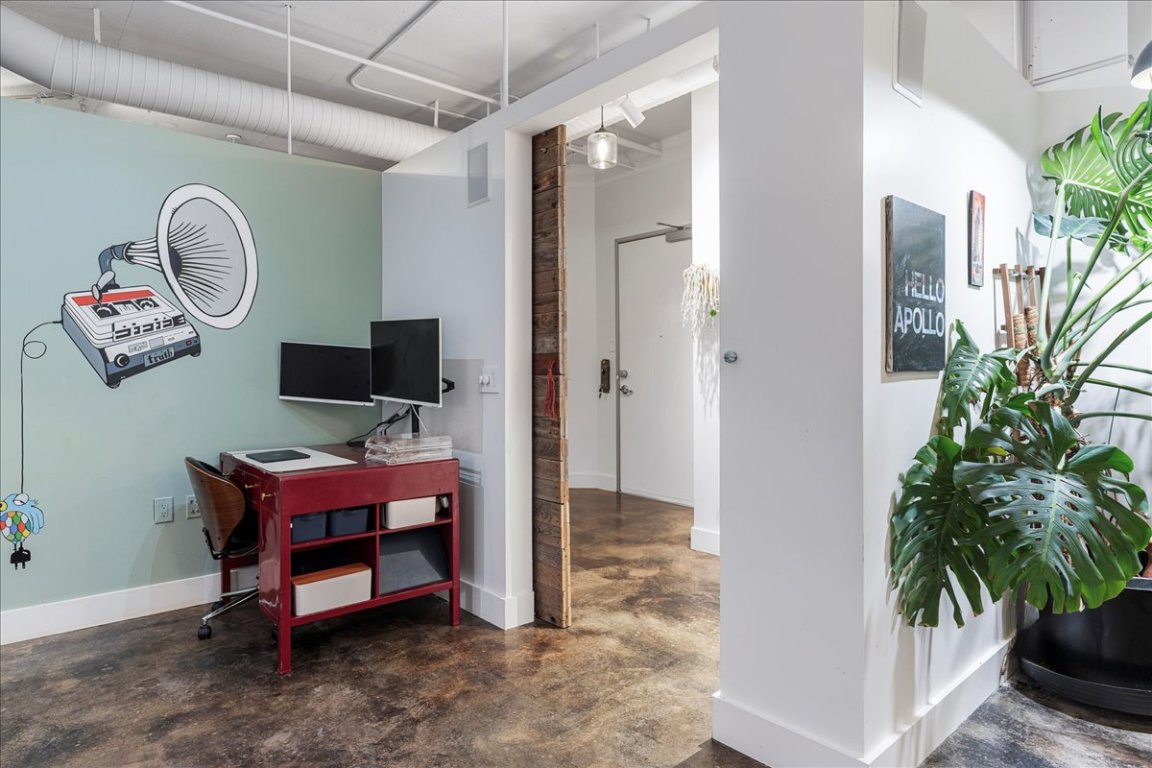 311 West 5th Street, Unit 1008 Austin, TX 78701 - Photo 18 of 31 a view of a workspace with furniture