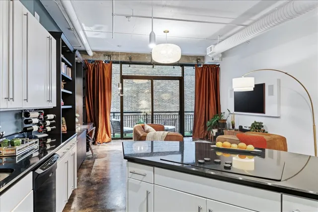 a view of balcony with furniture