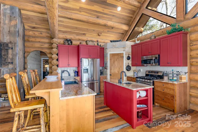 a bathroom with a sink a toilet and bathtub