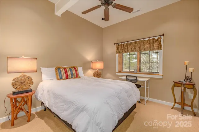 a view of a house with a tree