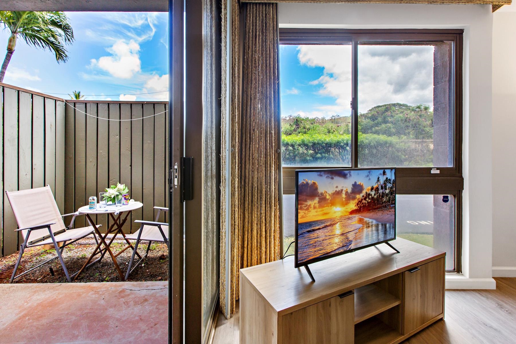 4310 Lower Honoapiilani Road, Unit 218 Lahaina, HI 96761 - Photo 12 of 30 a view of a living room and a window