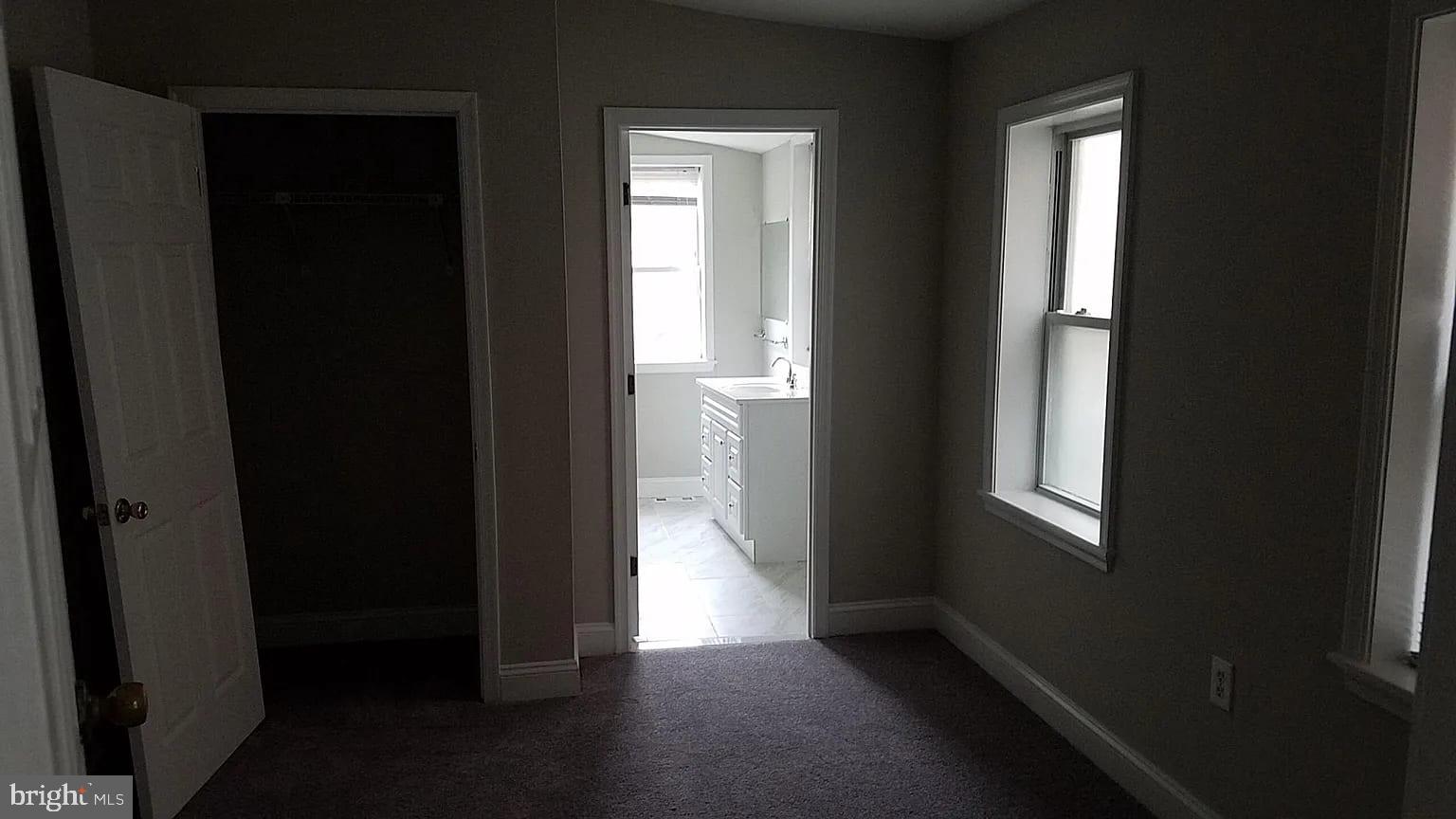 1128 South Hanover Street Baltimore, MD 21230 - Photo 21 of 26 a view of hallway with windows