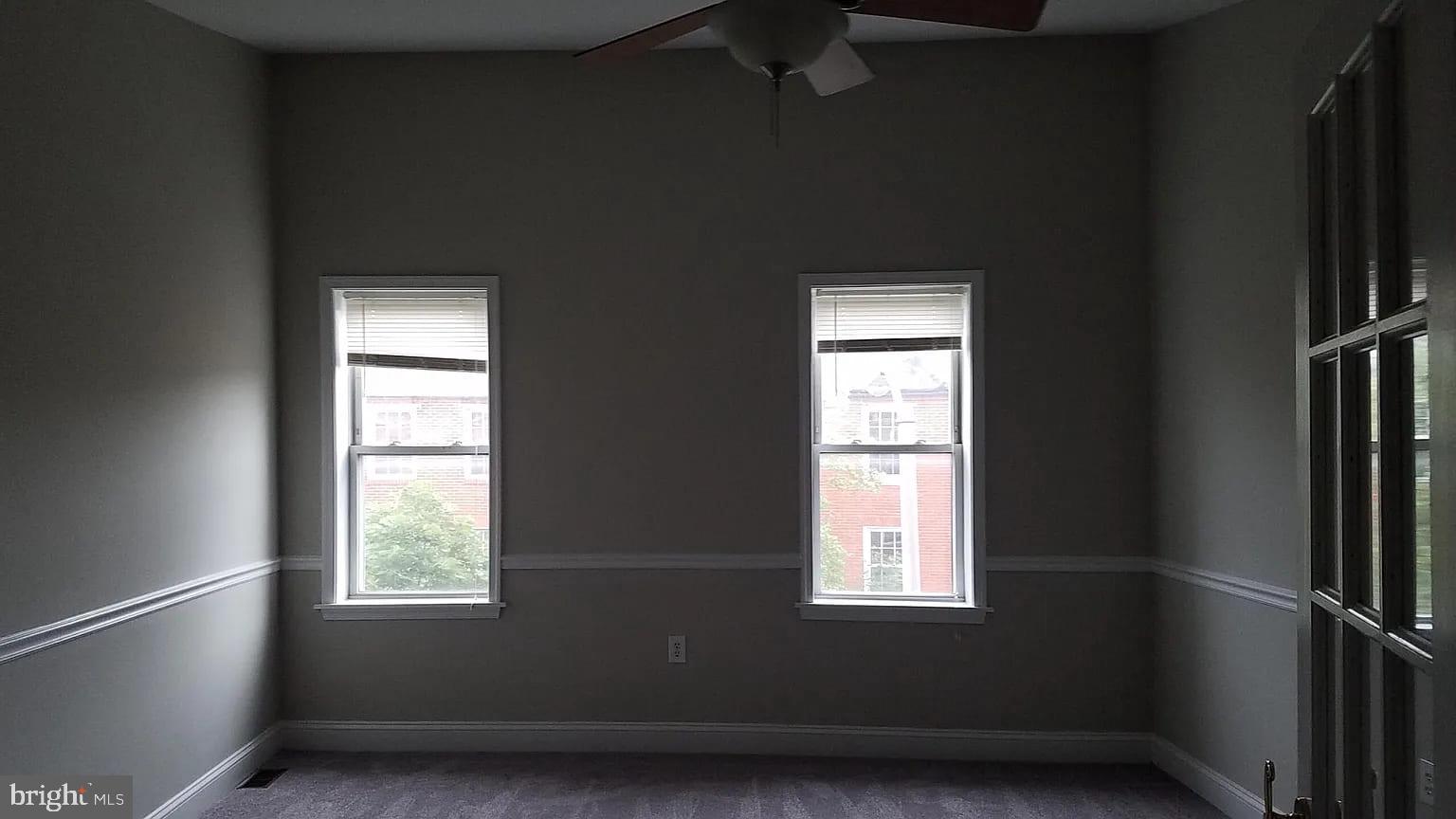 1128 South Hanover Street Baltimore, MD 21230 - Photo 6 of 26 a view of an empty room with a window