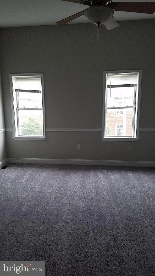 1128 South Hanover Street Baltimore, MD 21230 - Photo 9 of 26 an empty room with a window