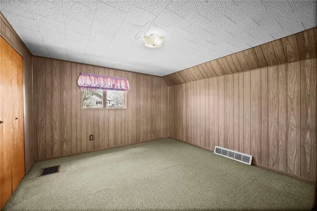 a view of front door with wooden floor