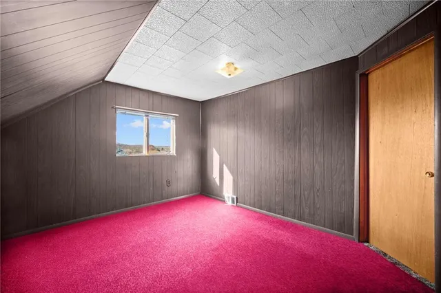 a view of a kitchen with furniture and a kitchen