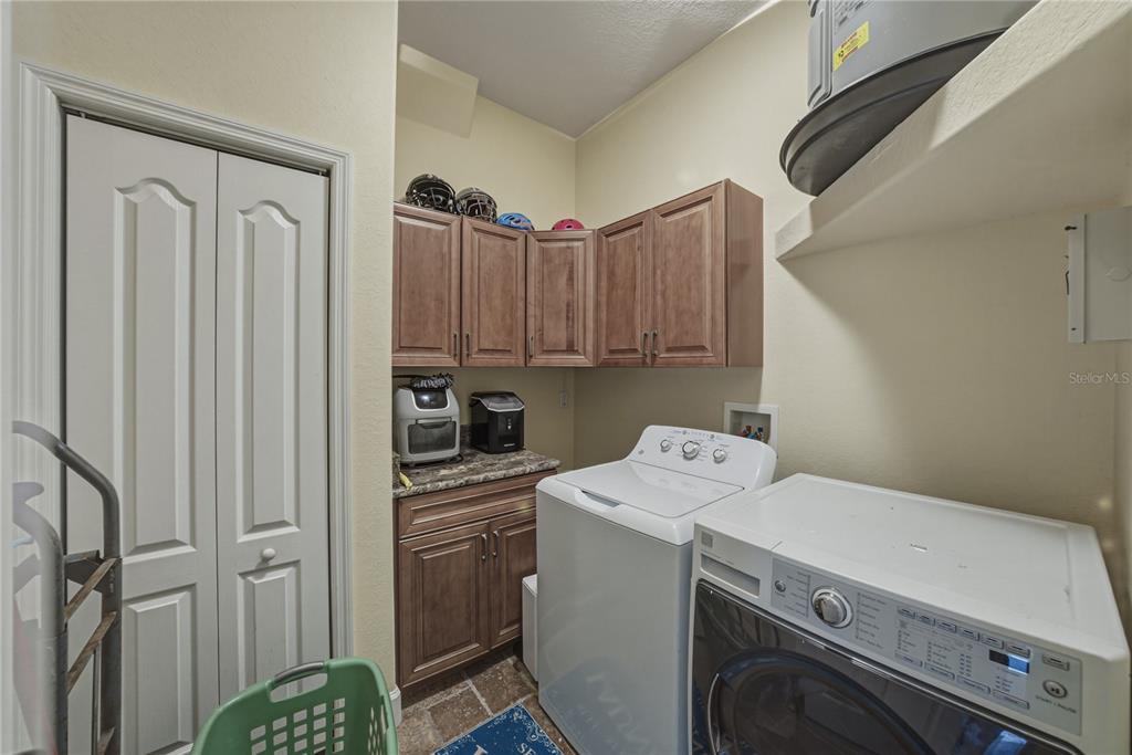 4178 Des Prez Court Hernando Beach, FL 34607 - Photo 26 of 76 a utility room with dryer and washer