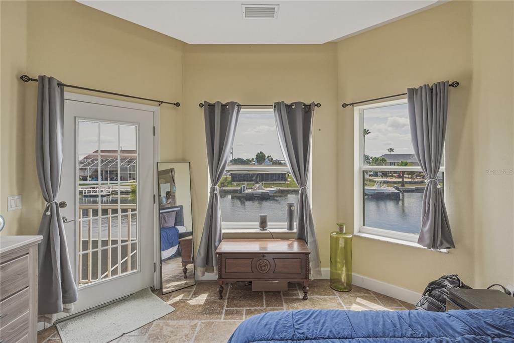 4178 Des Prez Court Hernando Beach, FL 34607 - Photo 29 of 76 a room with furniture and a window
