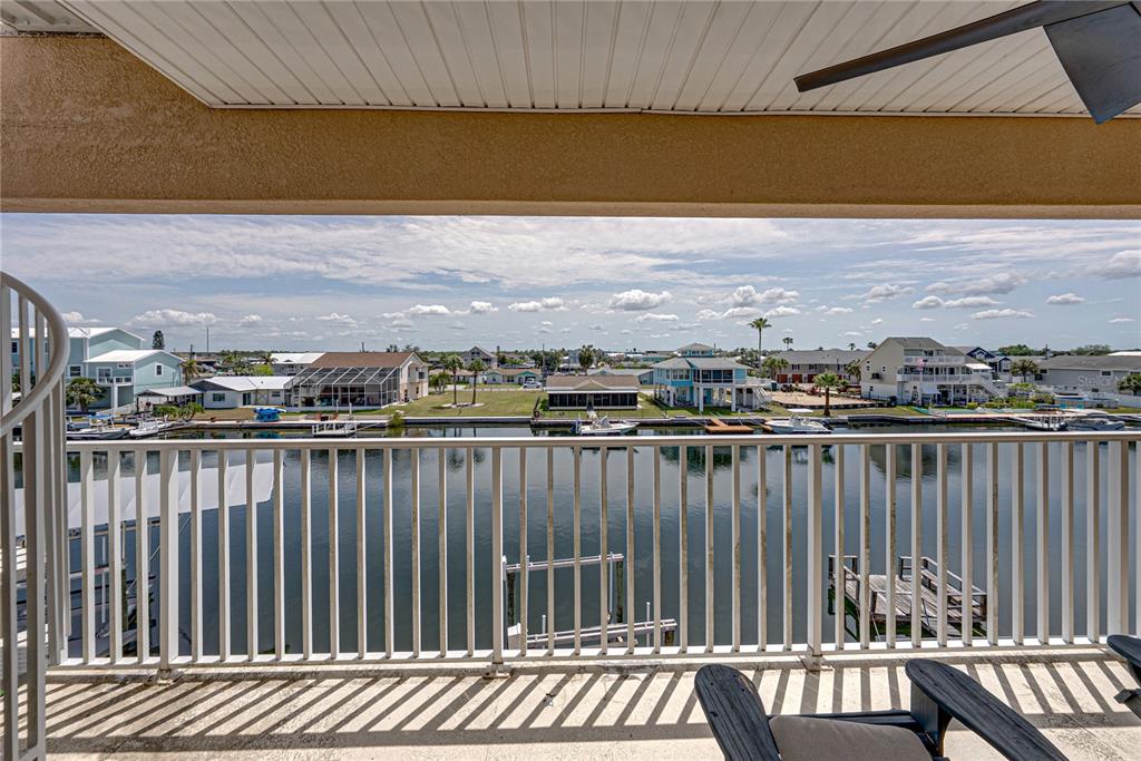 4178 Des Prez Court Hernando Beach, FL 34607 - Photo 42 of 76 a view of a balcony with wooden floor