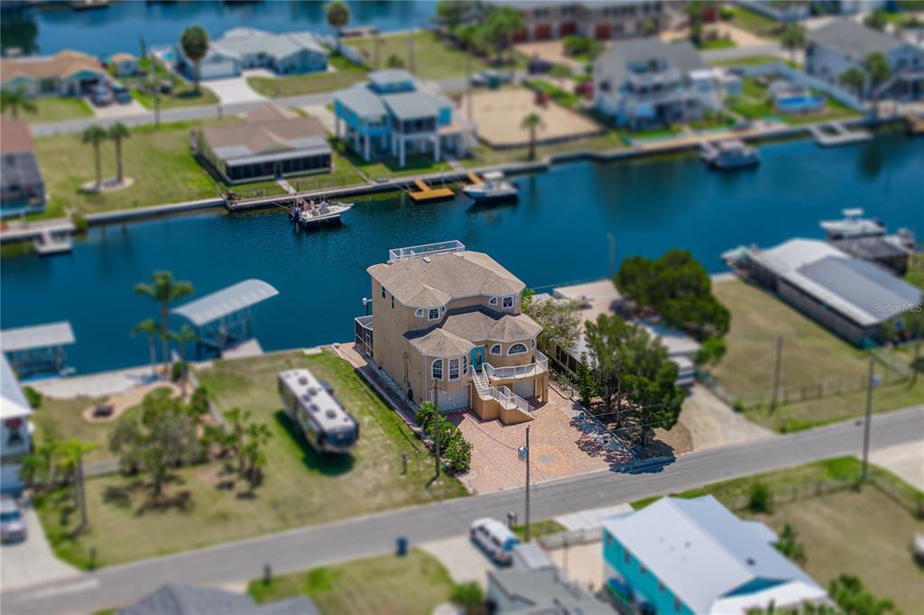 4178 Des Prez Court Hernando Beach, FL 34607 - Photo 61 of 76 an aerial view of a house with a lake view