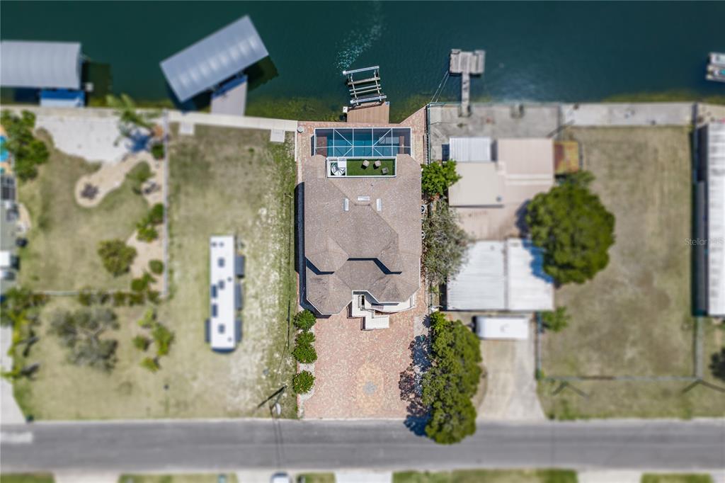 4178 Des Prez Court Hernando Beach, FL 34607 - Photo 63 of 76 an aerial view of residential houses with outdoor space