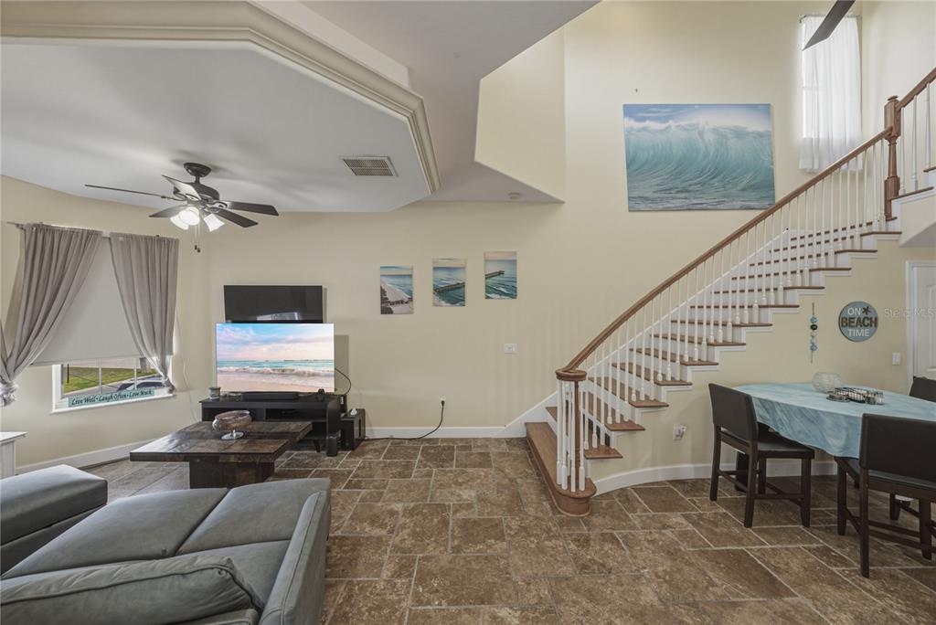 4178 Des Prez Court Hernando Beach, FL 34607 - Photo 8 of 76 a living room with furniture and a flat screen tv