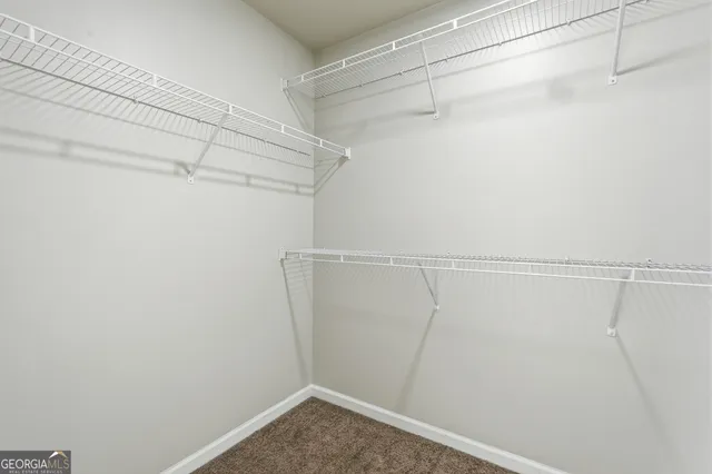 a view of a room with racks on the wall