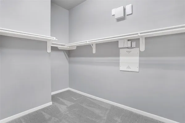 a view of an empty walk in closet