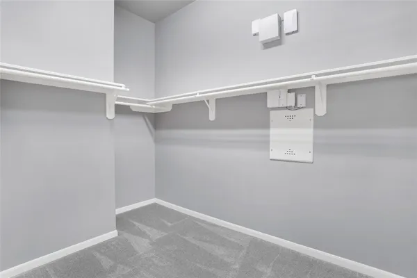 a view of an empty walk in closet