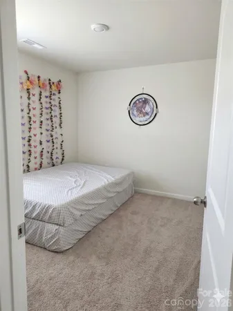 a view of a livingroom with wooden floor