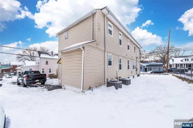 a view of a house with a snow