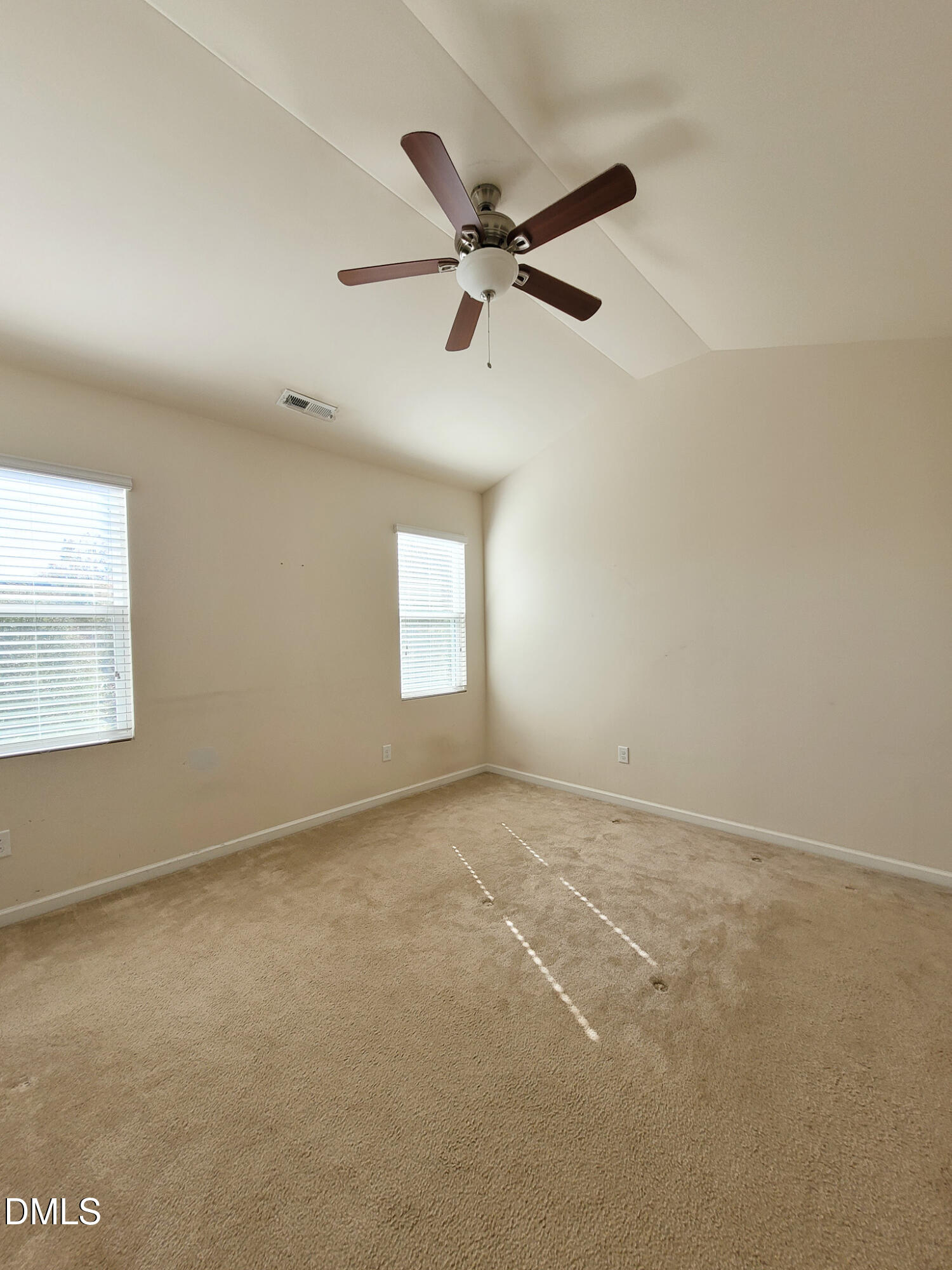 8951 Commons Townes Drive Raleigh, NC 27616 - Photo 17 of 40 a view of an empty room with a window