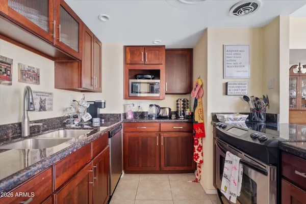 $430,000 | 207 West Clarendon Avenue, Unit F6, Phoenix, AZ 85013