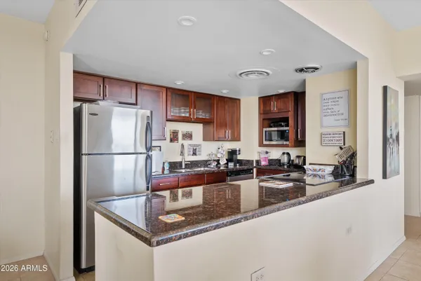 $430,000 | 207 West Clarendon Avenue, Unit F6, Phoenix, AZ 85013