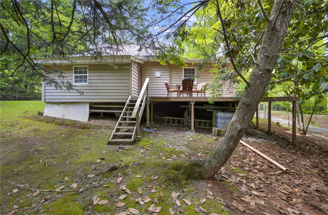 437 West Gate Road Pickens, SC 29671 - Photo 17 of 47 This secluded property features a welcoming deck, perfect for outdoor relaxation.