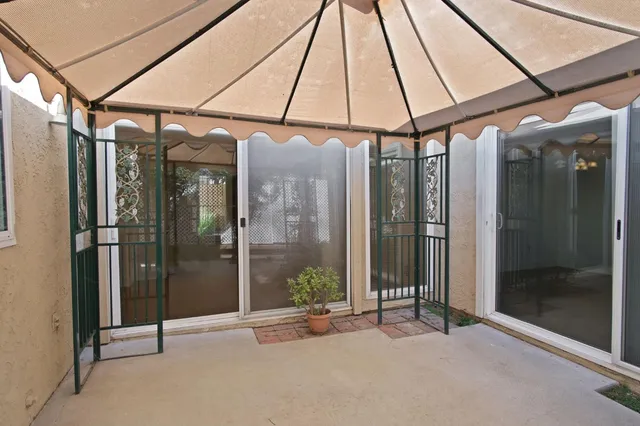 a view of house with garage