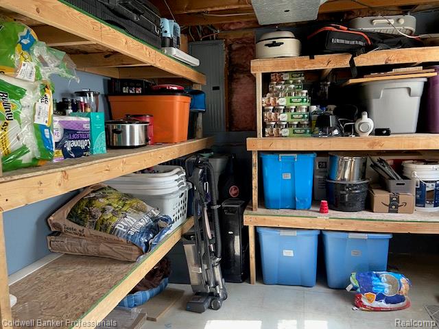 4615 5 Lakes Road North Branch, MI 48461 - Photo 17 of 27 Utility space featuring built-in wooden shelving for organization