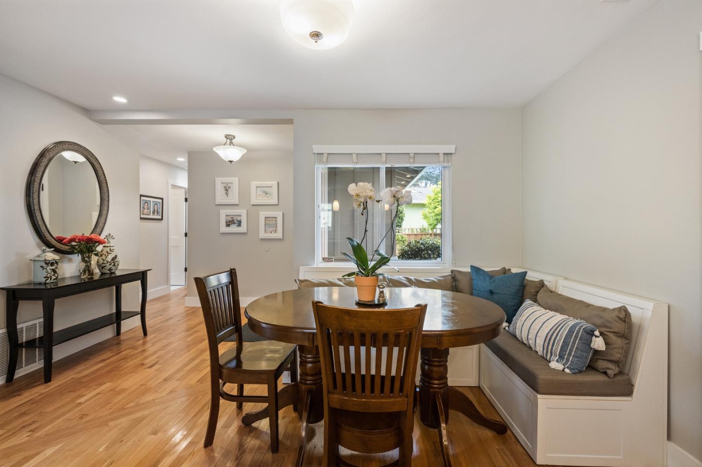 26571 Oliver Road Carmel, CA 93923 - Photo 13 of 63 a dining room with furniture and wooden floor