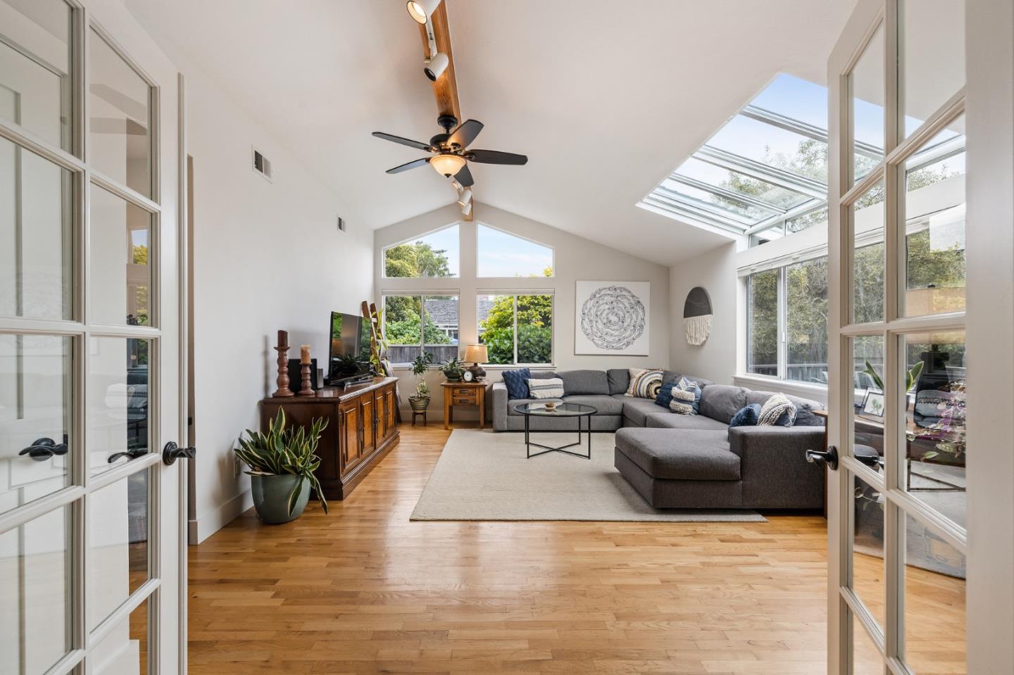 26571 Oliver Road Carmel, CA 93923 - Photo 16 of 63 a living room with furniture large window and wooden floor