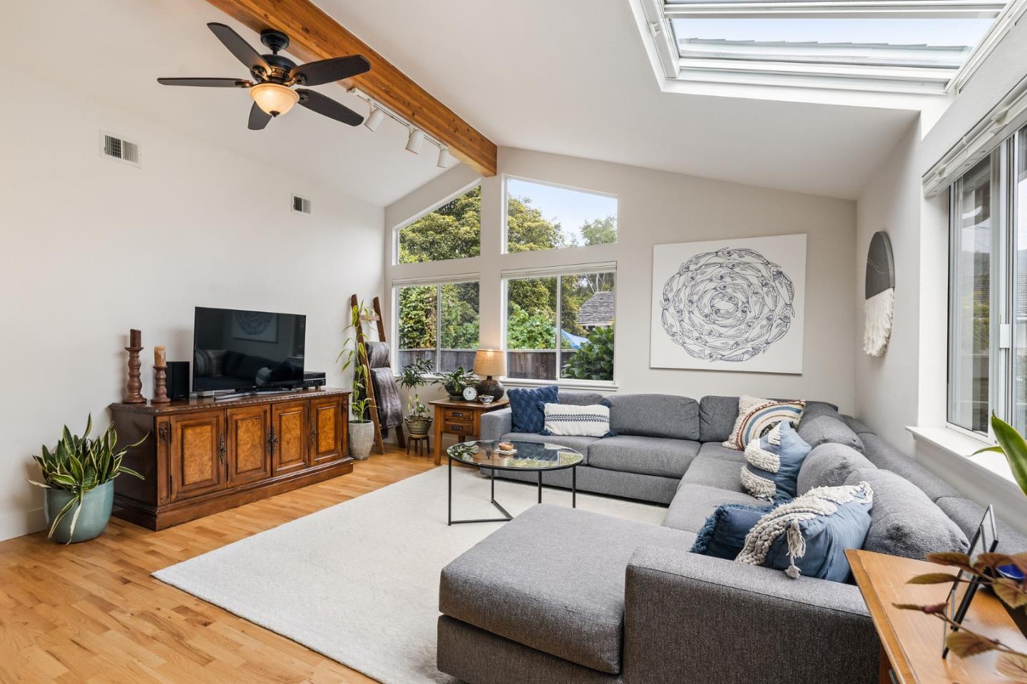 26571 Oliver Road Carmel, CA 93923 - Photo 20 of 63 a living room with furniture and a flat screen tv