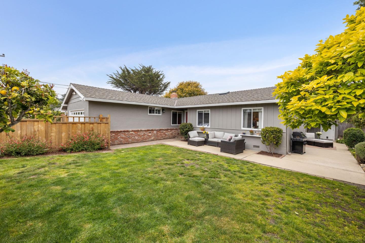 26571 Oliver Road Carmel, CA 93923 - Photo 2 of 63 a view of a house with backyard and sitting area