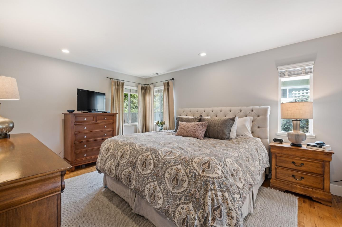26571 Oliver Road Carmel, CA 93923 - Photo 22 of 63 a bedroom with a bed and a tv