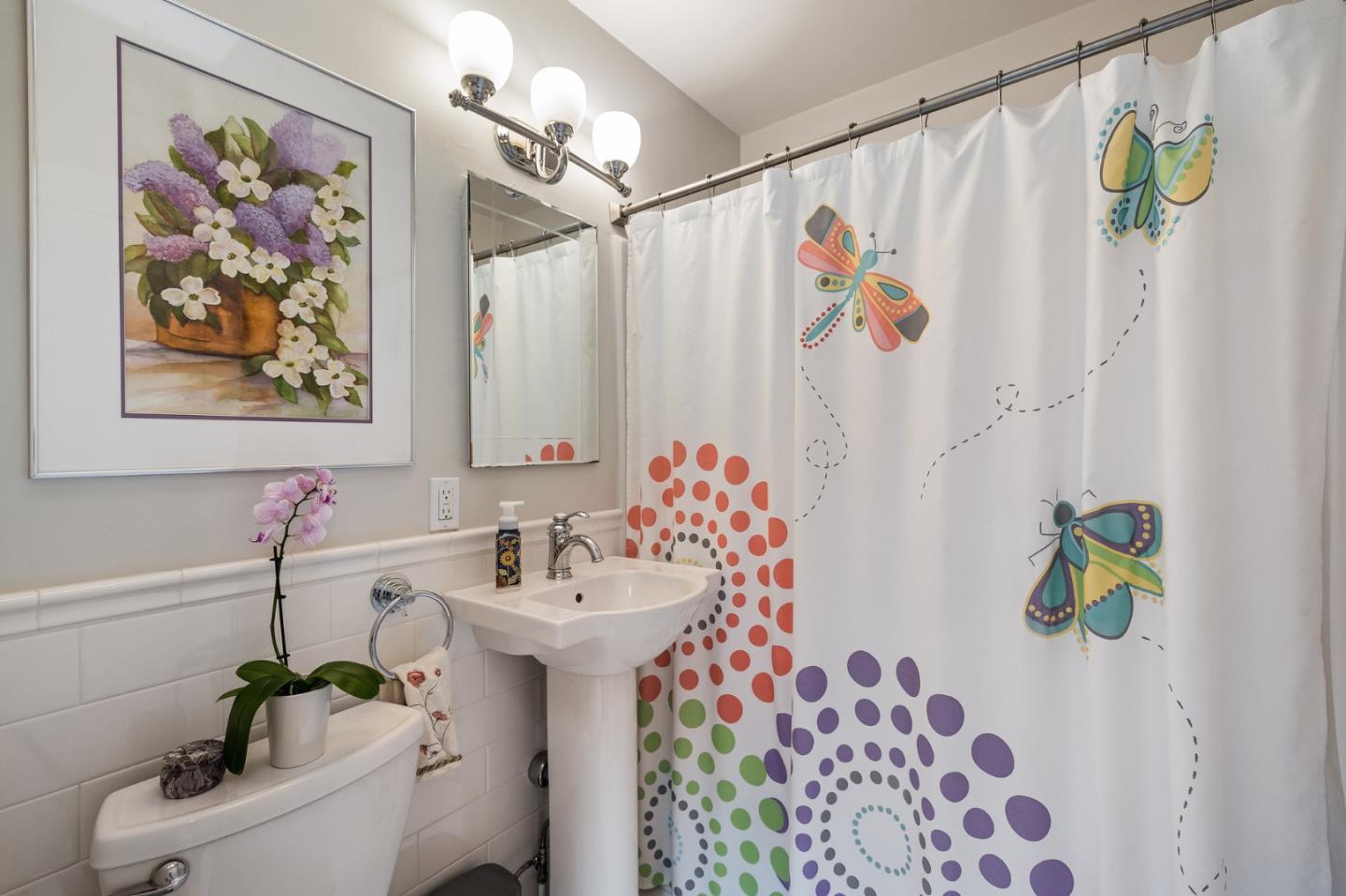 26571 Oliver Road Carmel, CA 93923 - Photo 31 of 63 a bathroom with a sink mirror and vanity