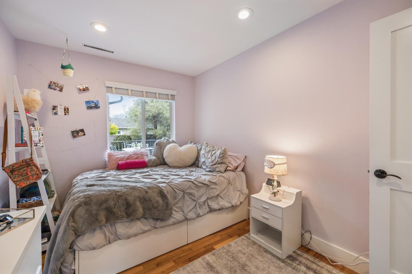 26571 Oliver Road Carmel, CA 93923 - Photo 33 of 63 a bedroom with a bed and a window