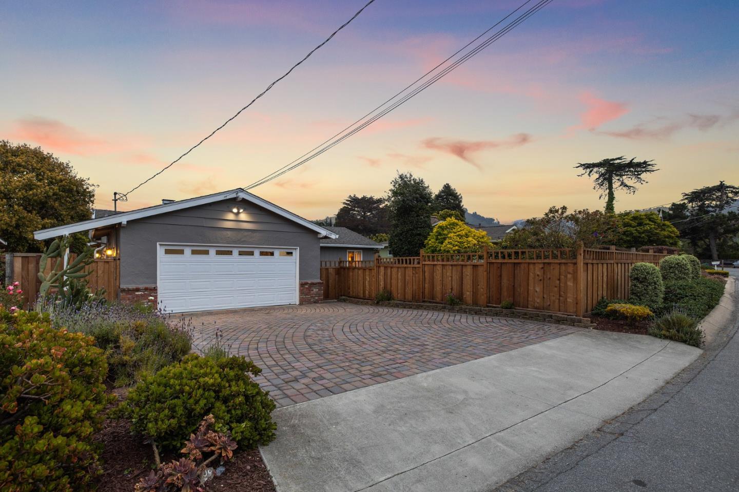 26571 Oliver Road Carmel, CA 93923 - Photo 44 of 63 a view of backyard of house with wooden fence