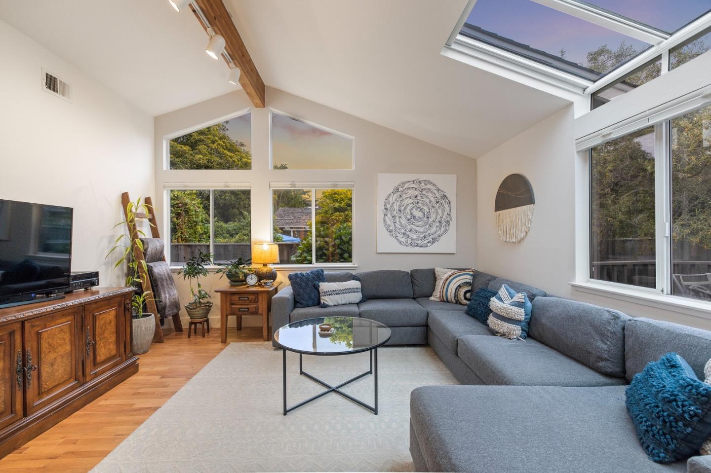 26571 Oliver Road Carmel, CA 93923 - Photo 48 of 63 a living room with furniture and a flat screen tv