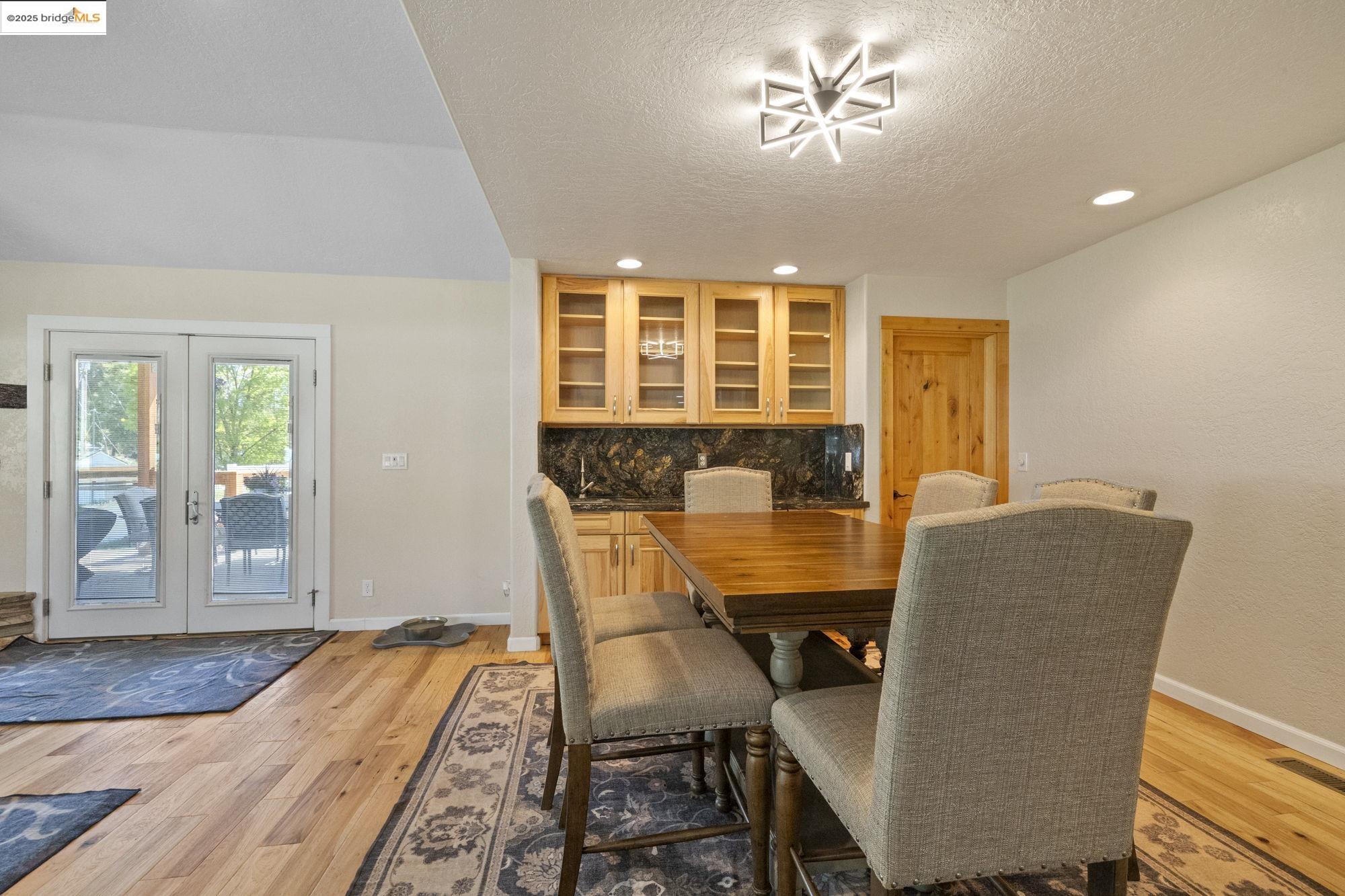 18060 Rob-Ric Road Sonora, CA 95370 - Photo 12 of 52 a workspace with furniture window and wooden floor