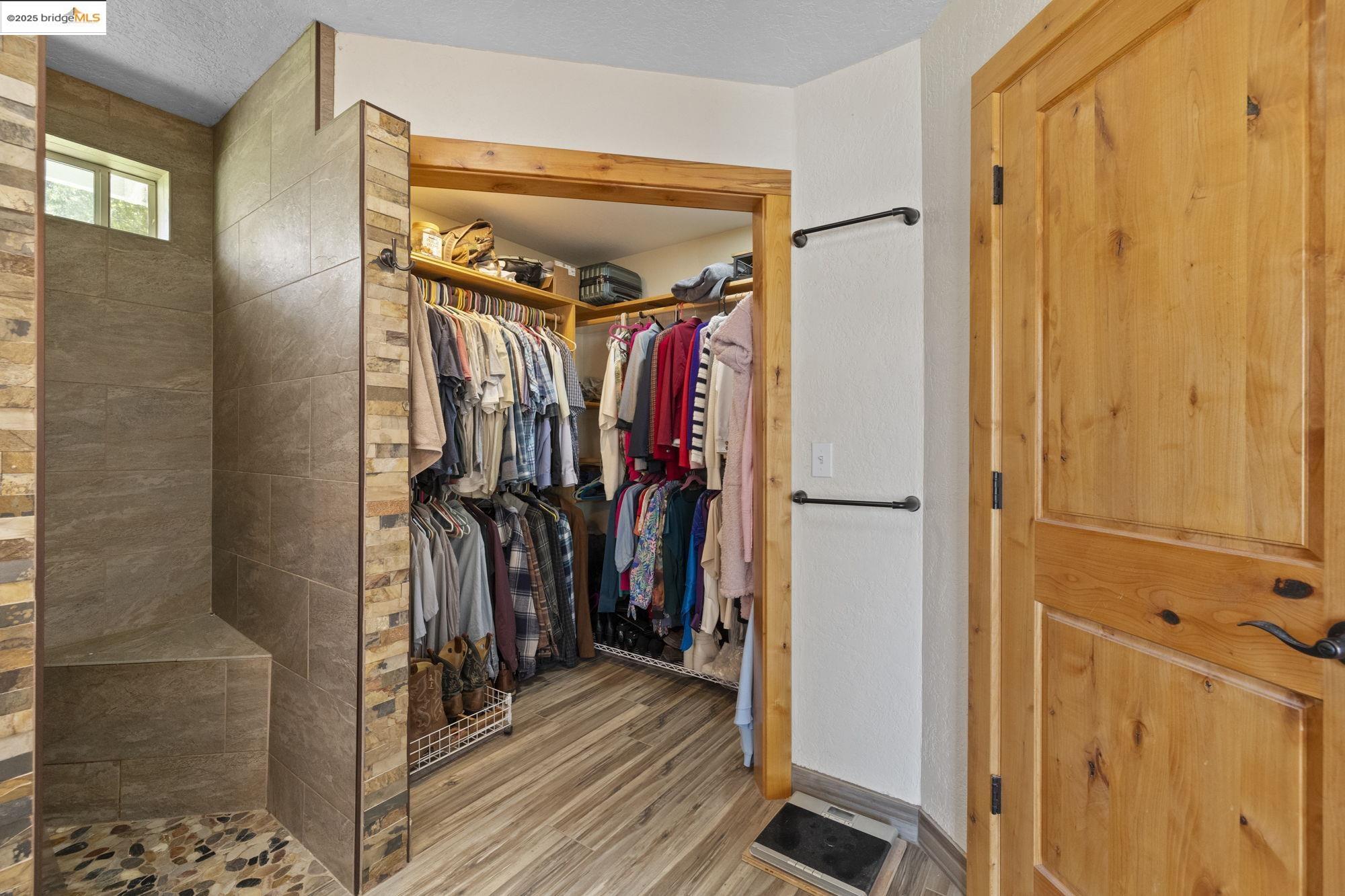 18060 Rob-Ric Road Sonora, CA 95370 - Photo 24 of 52 a view of walk in closet with clothes and shoes