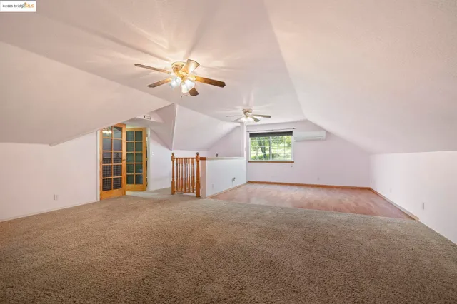 a living room with a fireplace and a floor