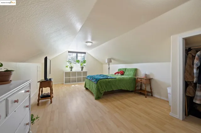 a view of a patio with wooden floor