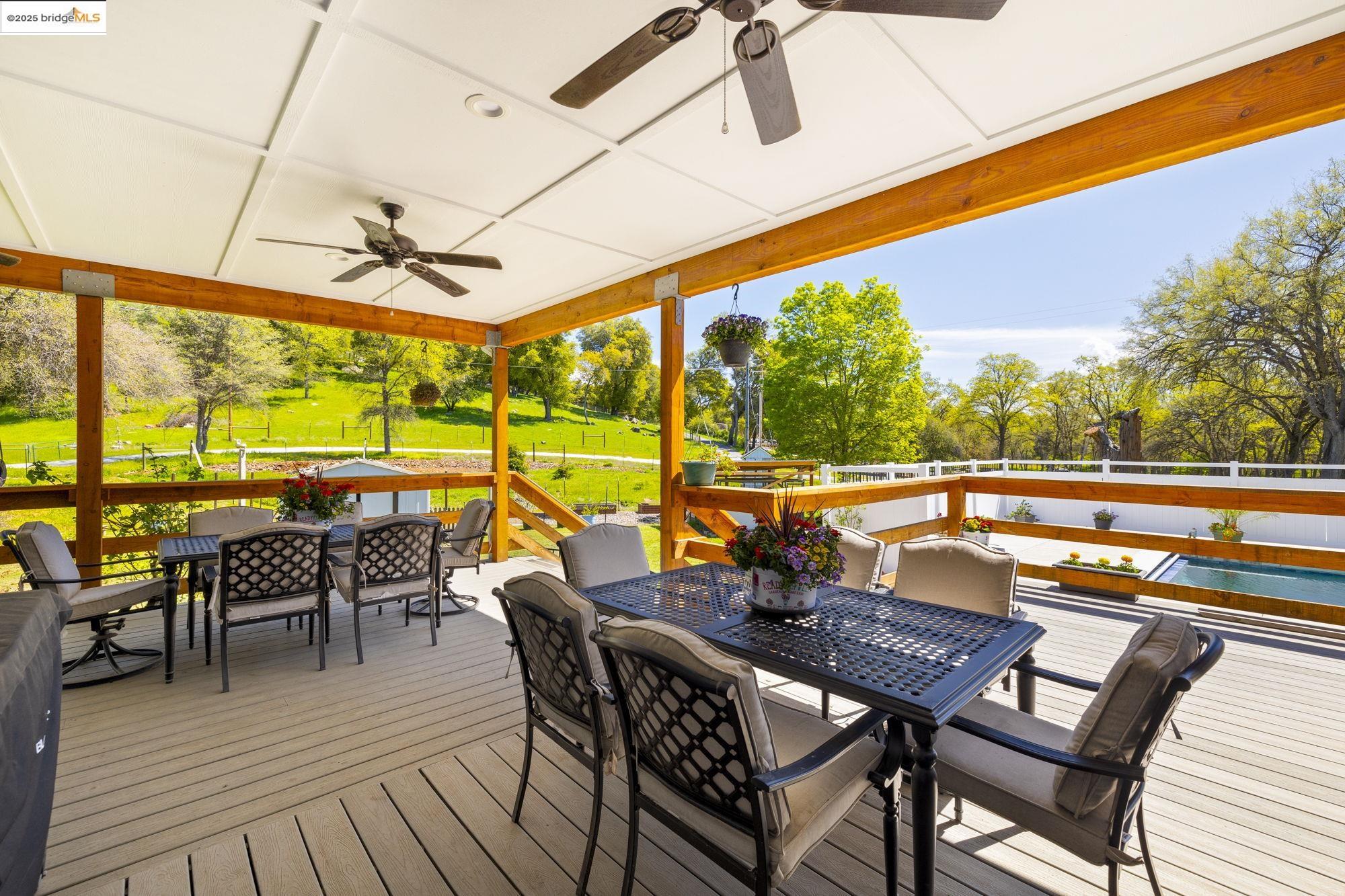 18060 Rob-Ric Road Sonora, CA 95370 - Photo 33 of 52 a view of a patio with wooden floor