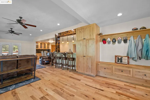 a living room with furniture window and a fireplace